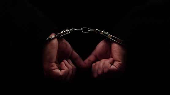 handcuffs arrest police hands guilty jail